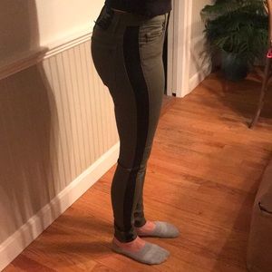 Black orchid green with stripe jeans. LA designer